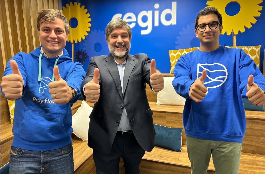 Santiago Solanas, de Cegid (en el medio), con los fundadores de Payflow.